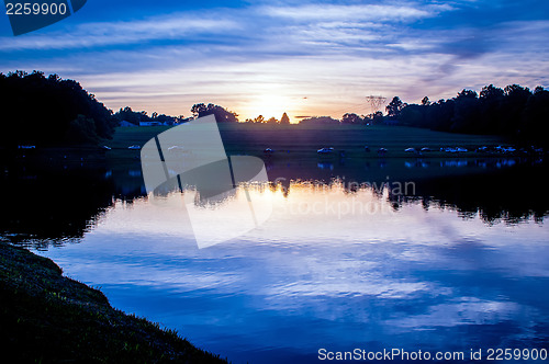 Image of  fishing lake at  sunset