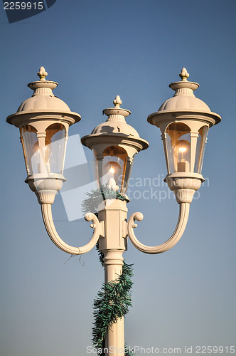 Image of beautiful classic street lamp post by the street