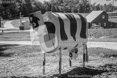 Image of metal cow on farm