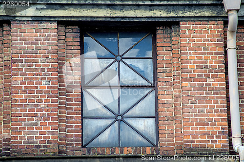 Image of old window of an refinery