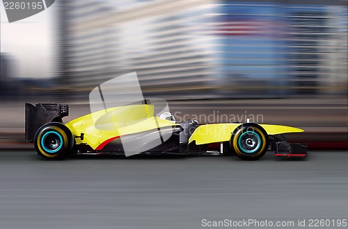 Image of formula one car driving