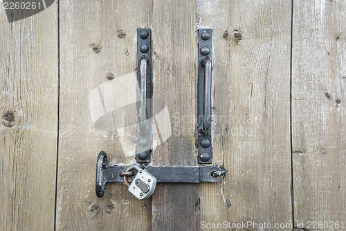 Image of gate with padlock
