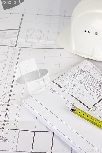 Image of Construction plan and measuring tape
