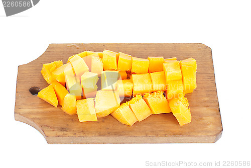 Image of Slices of pumpkin and cutting board,isolated on white background 