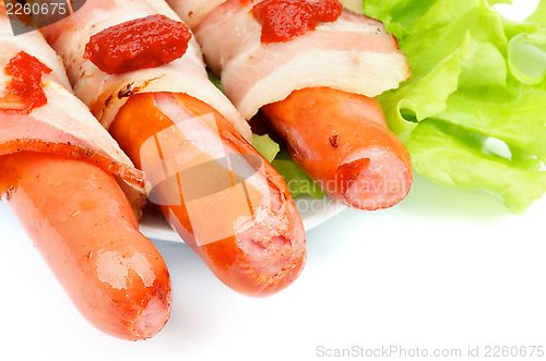 Image of Sausages Wrapped in Bacon