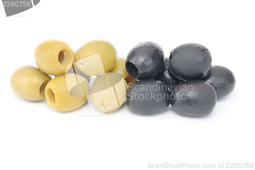 Image of Some pitted black and green olives isolated on the white background