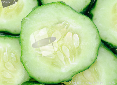 Image of cucumber sliced as food background.