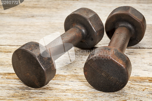 Image of vintage iron dumbbells