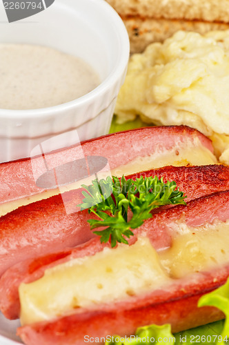 Image of sausages with cheese and omelette