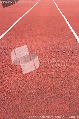 Image of perspective of cinder running track at the sport stadium