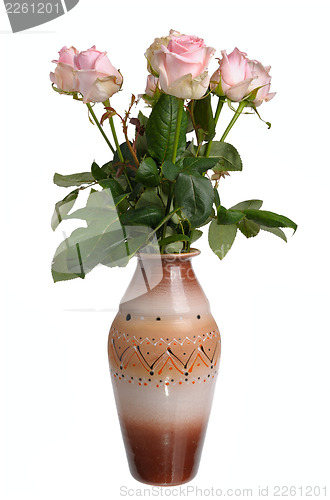 Image of Bouquet of pink roses in a ceramic vase