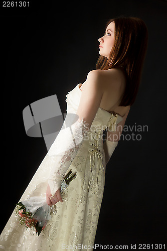 Image of young attractive girl in a wedding dress