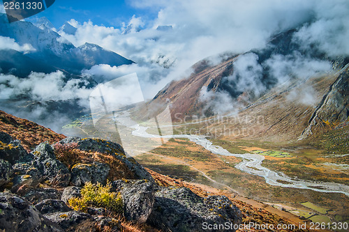 Image of Autumn in Himalaya: village and river in the valley