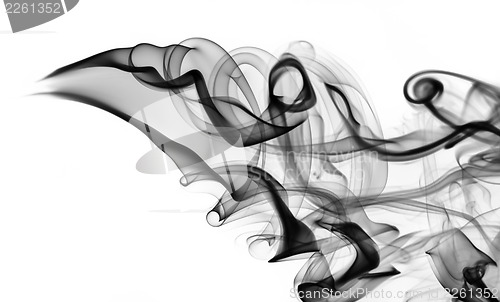 Image of black smoke abstraction with swirls on white