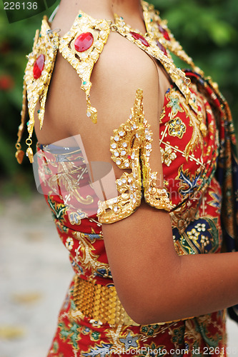 Image of Thai female in bright traditional dress