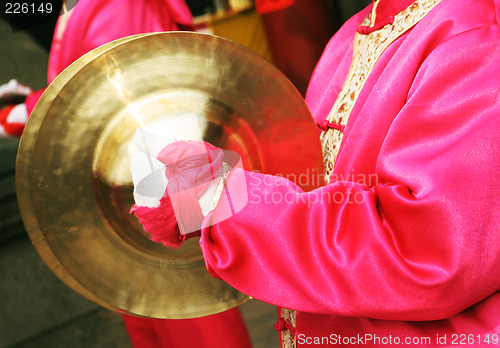 Image of Chinese New Year celebrations - close-up of a female drummer.