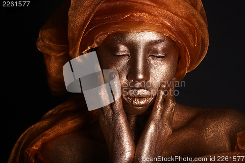 Image of Stunning African Amercian Woman Painted With Gold 