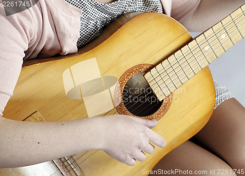 Image of Playing the guitar