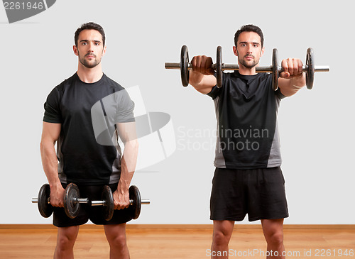 Image of Man Working Out With Dumbbels