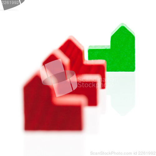 Image of Small wooden houses isolated, focus on green house