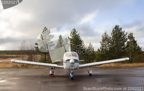 Image of Small airplane parking - front view