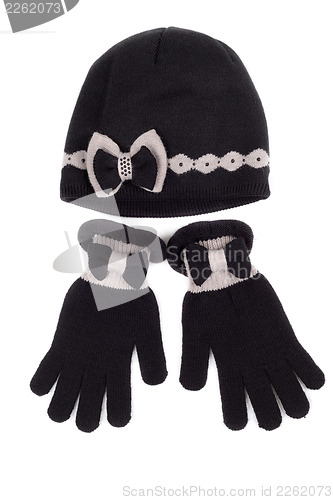 Image of Set of pairs of gloves and knit hat