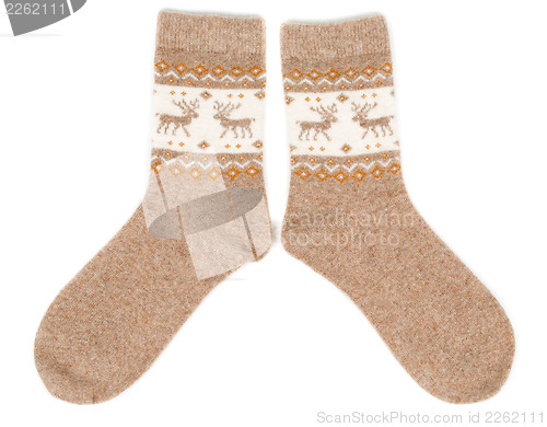 Image of pair of wool socks with a pattern deer