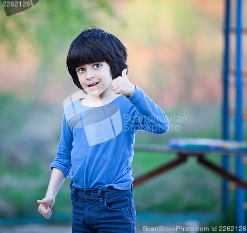 Image of smiling black-haired boy