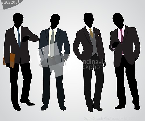 Image of Four businessman silhouettes 