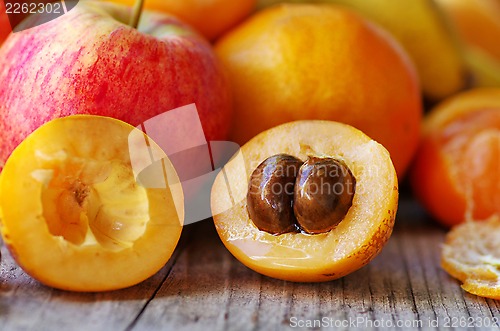 Image of Half of ripe loquat medlar