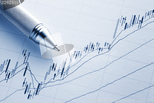 Image of Increasing stock market graph with pen