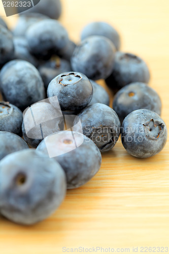 Image of Blueberry on wooden table 