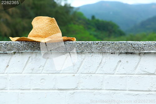 Image of Wicker hat on the wall 