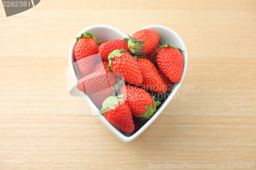 Image of Strawberry in heart shape bowl