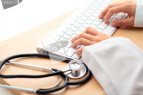 Image of Doctor using computer