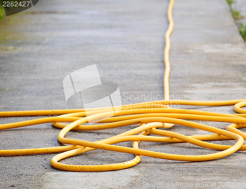 Image of Plastic soft water pipe on the ground 