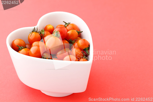 Image of Cherry tomato in heart shape bowl 