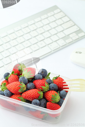 Image of Healthy lunch box in office 
