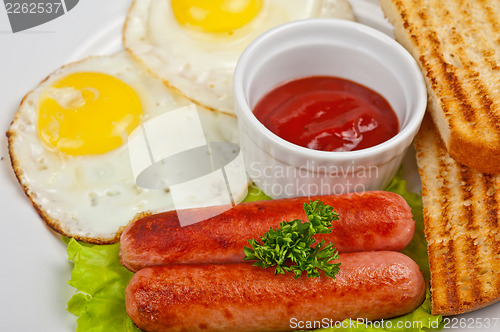Image of Fried eggs with sausages