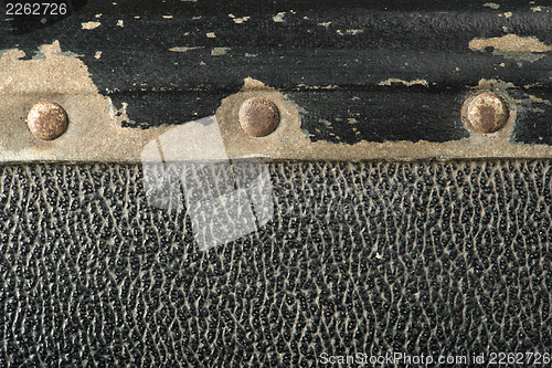 Image of Rivets and leather parts from suitcase