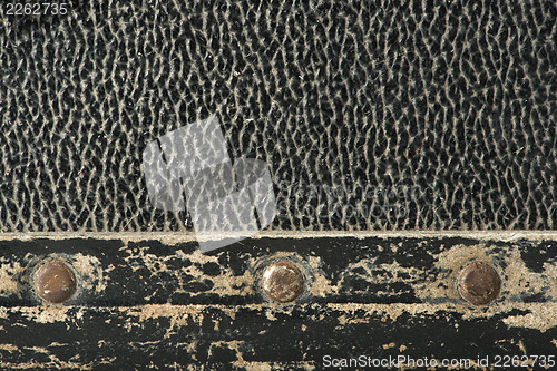 Image of Rivets and leather parts from suitcase