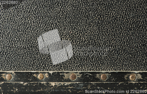 Image of Rivets and leather parts from suitcase