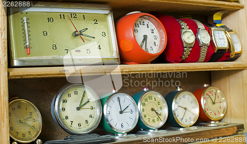 Image of Old clocks on a shelf