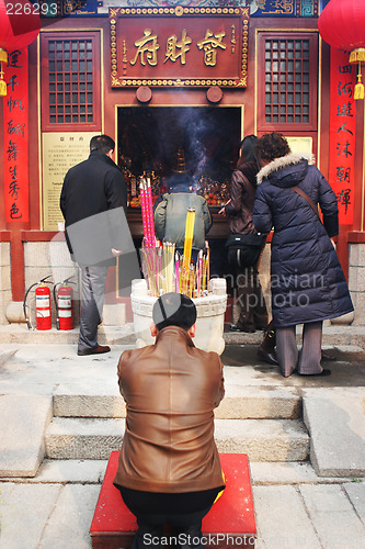 Image of Chinese New Year celebrations and prayers (Year of the Pig).