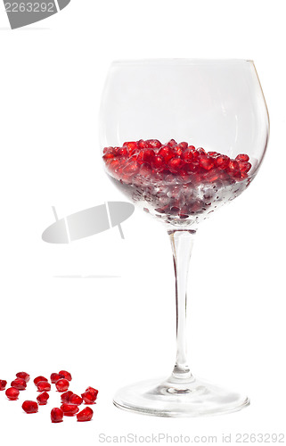 Image of fresh grains of pomegranate in wine glass