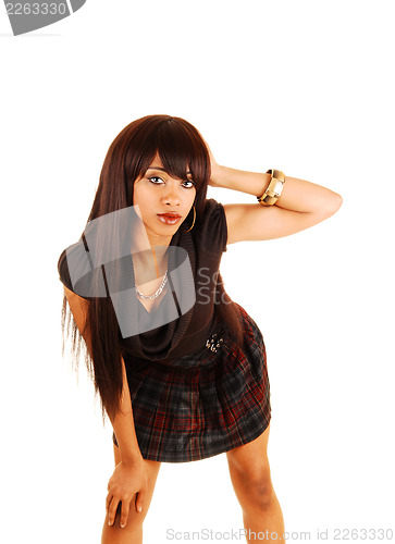 Image of Girl bending toward camera.
