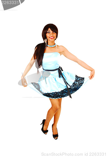 Image of Girl showing her dress.