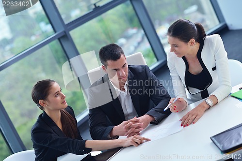 Image of business people in a meeting at office