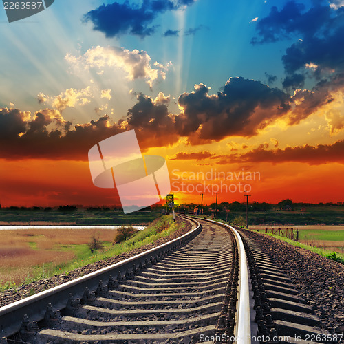 Image of red sunset over railway to horizon