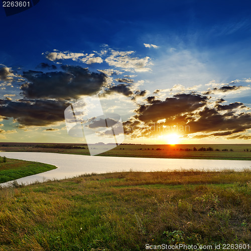 Image of dramatic sunset over river